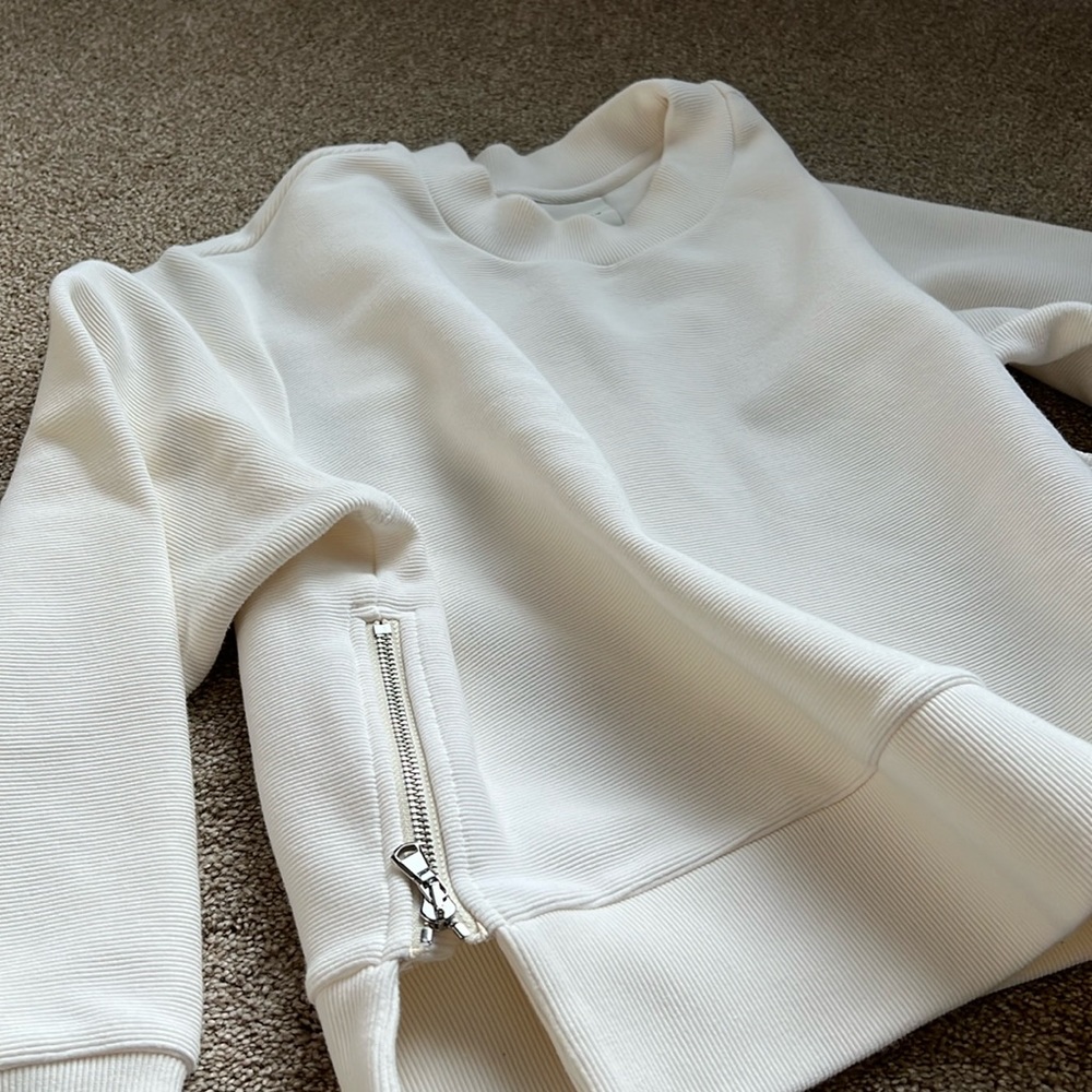 Varley side zip pull over